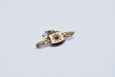 Lot 148 - A late 19th century 15ct gold ruby and diamond bar brooch