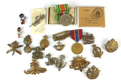 Lot 170 - Fourteen Military badges and two medals