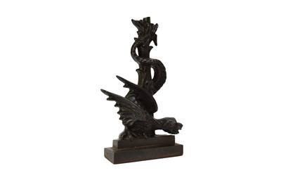 Lot 549 - A 19th century Coalbrookdale cast iron doorstop, in the form of a dragon