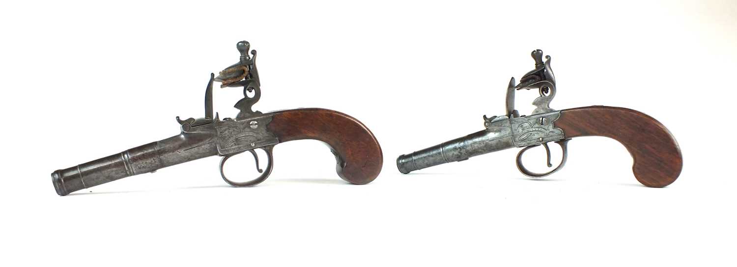 Lot 36 - A pair of late 18th century English flintlock pistols by Richard Parrett, Salisbury