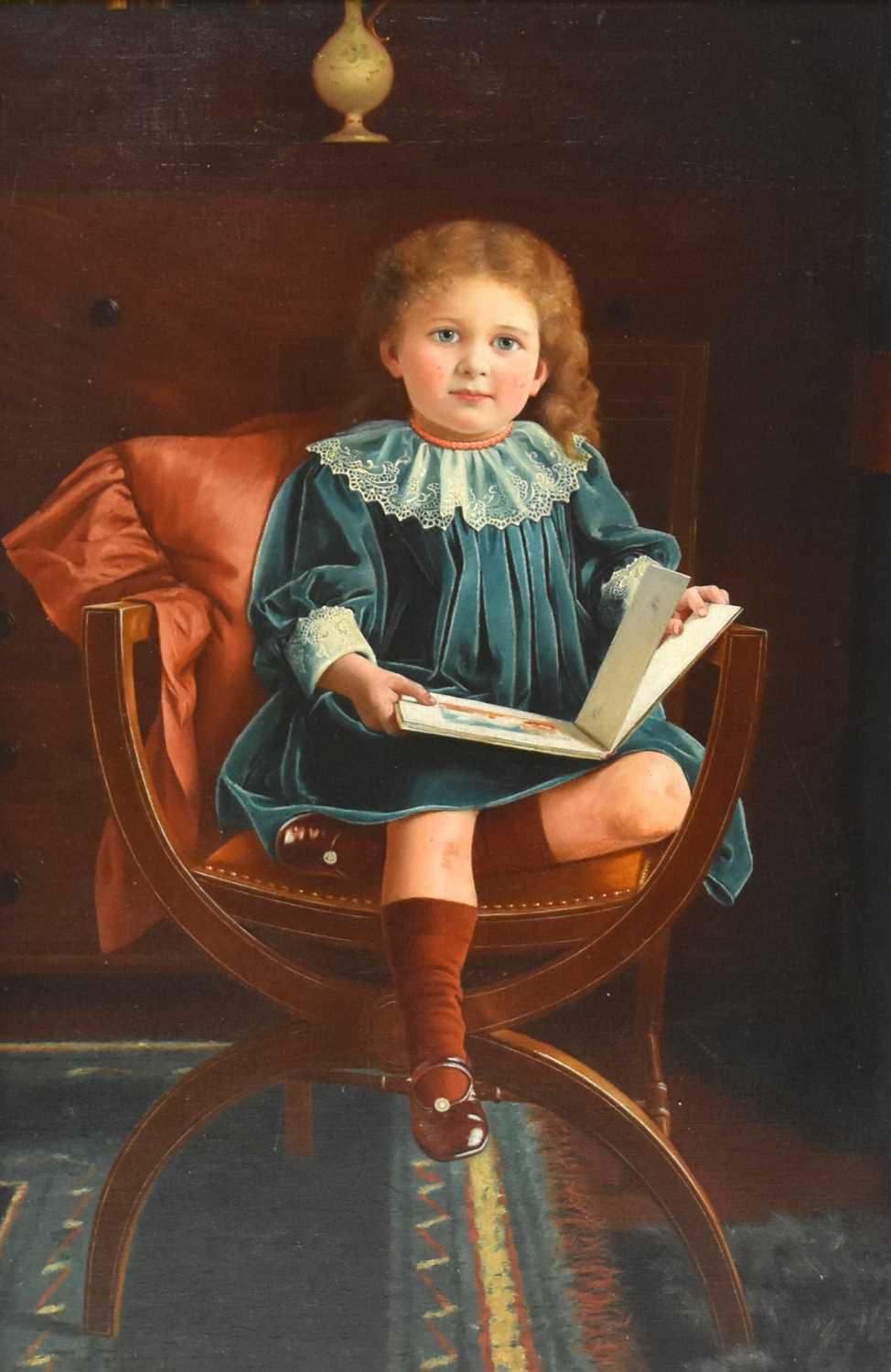 Lot 226 - Charles Spencelayh (British 1865-1958) Portrait of a Girl seated in a chair, holding a book