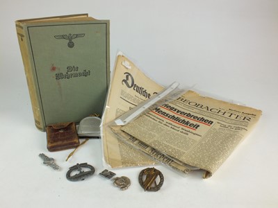 Lot 306 - A mixed grouping of German items comprising...