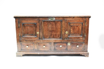 Lot 666 - An 18th century oak mule chest