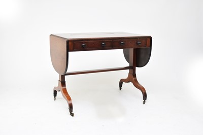 Lot 699 - An early 19th century rosewood veneered sofa table