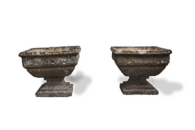 Lot 756 - Pair of cast stone footed planters
