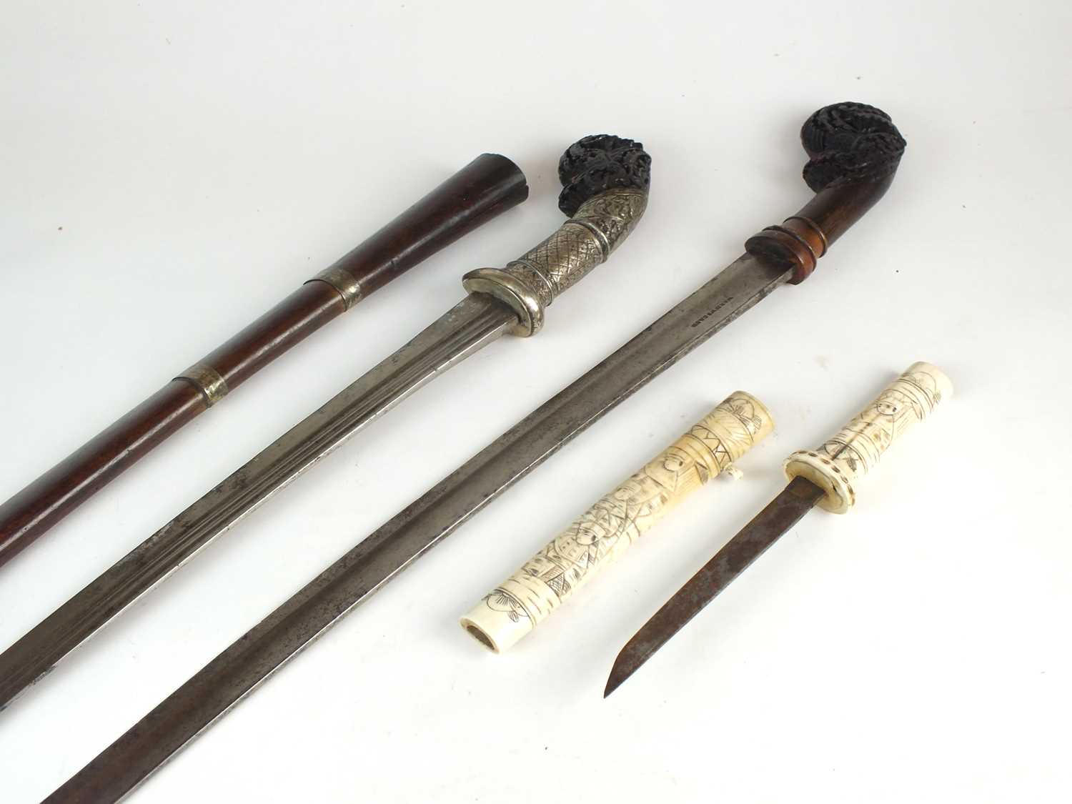 Lot 194 - Two Malayan Parang Short Swords and a Japanese bone tanto