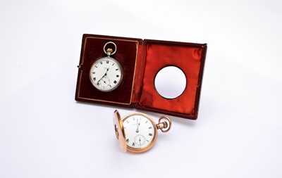 Lot 211 - A Waltham pocket watch and a silver pocket watch in travel case