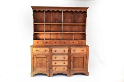 Lot 673 - A 19th century oak break-front dresser and associated rack