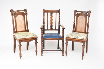 Lot 727 - A set of six carved oak dining chairs and a pair of associated oak carvers