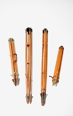 Lot 606 - A cased 'White Star' Lawrence & Mayo sextant and four wood surveying level tripods