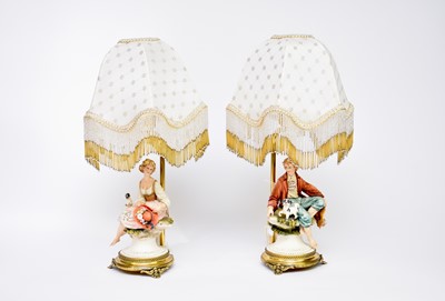 Lot 463 - A pair of Capodimonte porcelain table lamps by Cazzola