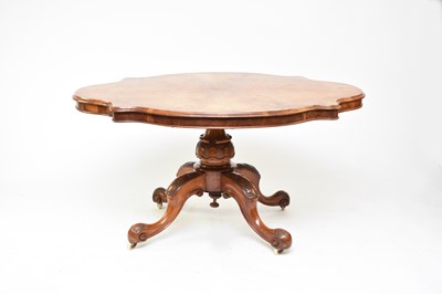 Lot 725 - A Victorian walnut veneered loo table