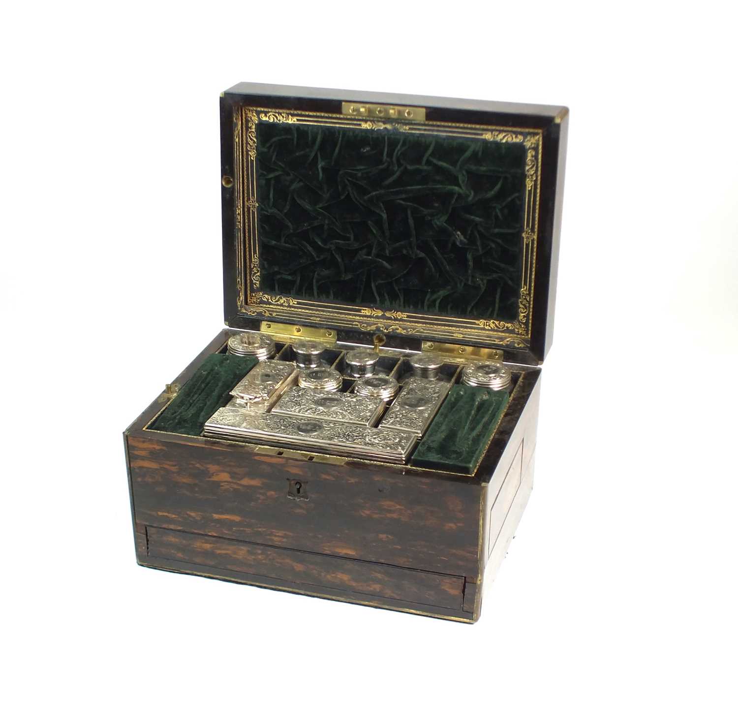 Lot 4 - A Victorian Coromandel cased silver mounted travelling dressing table box