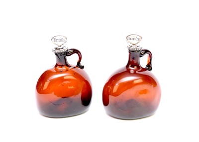 Lot 377 - A pair of Victorian amber glass spirit decanters for Brandy and Whiskey