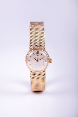 Lot 122 - Omega: A lady's 9ct gold Ladymatic bracelet wristwatch