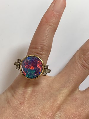 Lot 87 - An opal doublet ring and diamond ring