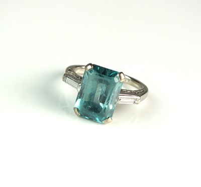 Lot 47 - A three stone blue zircon and diamond ring