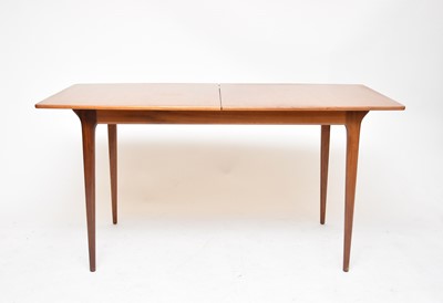Lot 738 - A mid-20th century McIntosh teak extending dining table and six chairs en suite