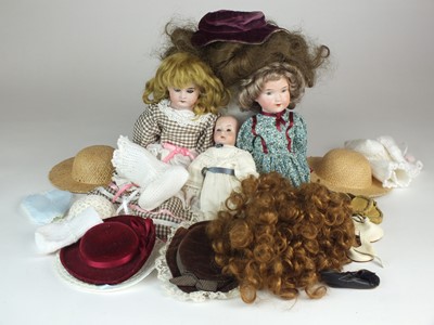 Lot 559 - Three small German bisque dolls