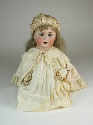 Lot 563 - A large Schutzmeister & Quendt German bisque doll