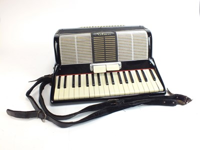 Lot 585 - Two cased piano accordions: Hohner and a Selmer