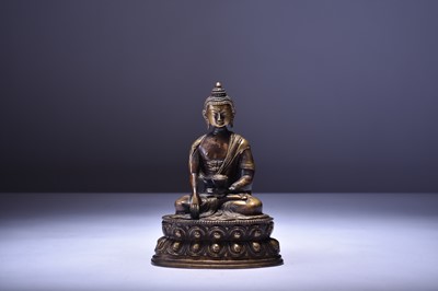 Lot 638 - A Sino-Tibetan bronze figure of a seated Bhudda