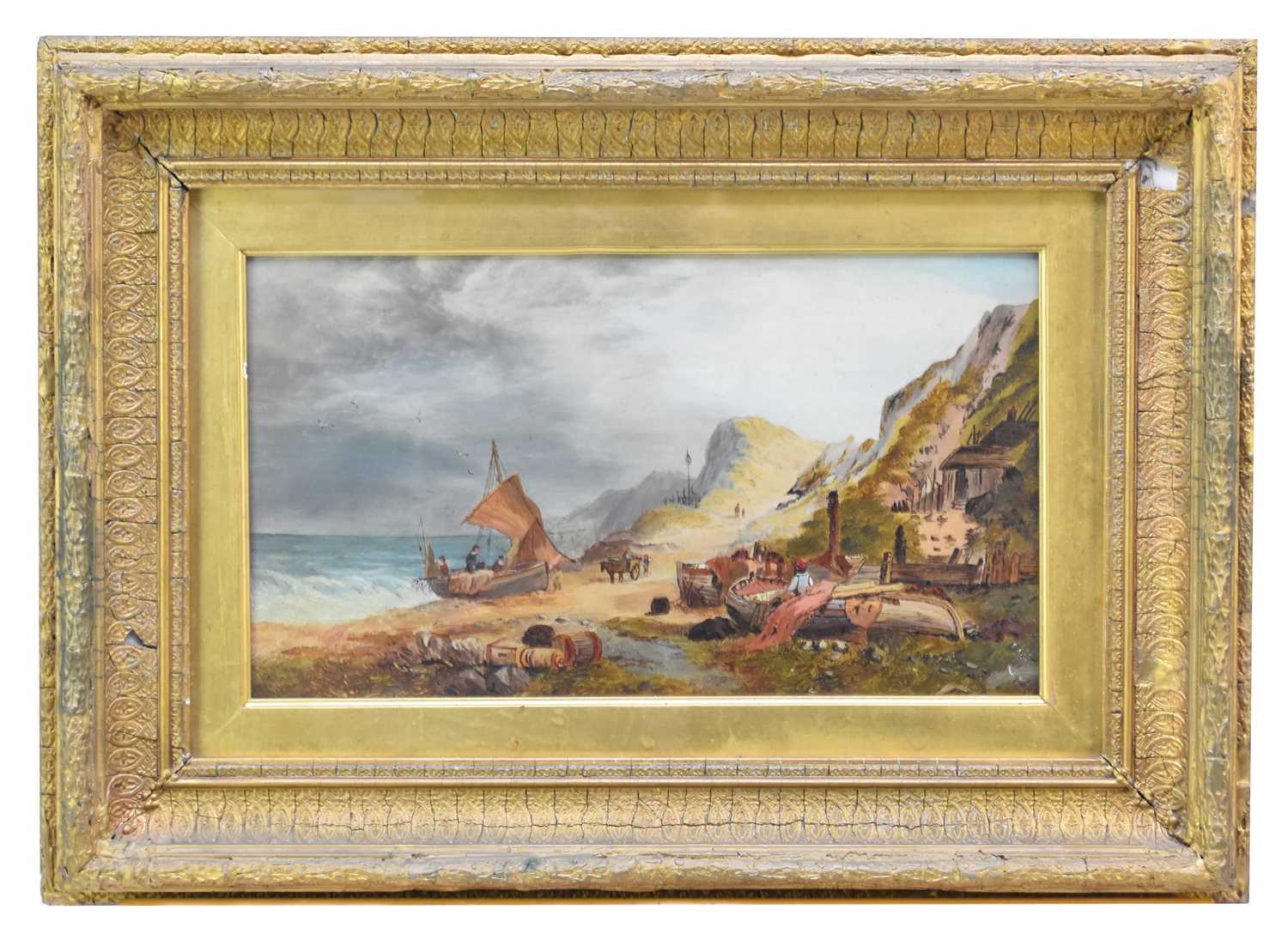 Lot 348 - English School circa 1870. A coastal scene with Fishermen by boats