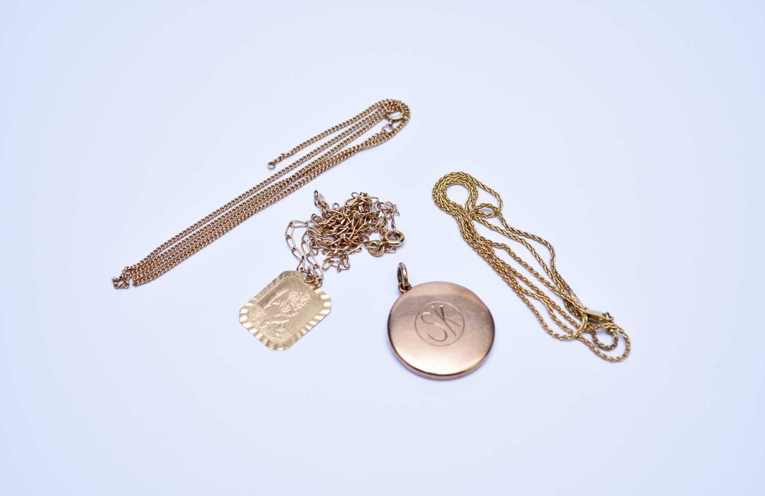 Lot 86 - A collection of chains and two pendants