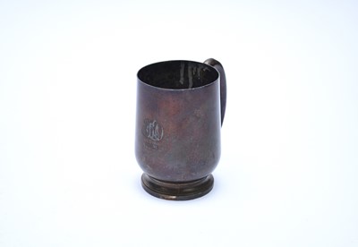 Lot 45 - A white metal mug