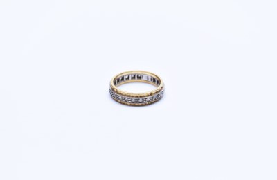Lot 102 - An 18ct gold paste set eternity ring