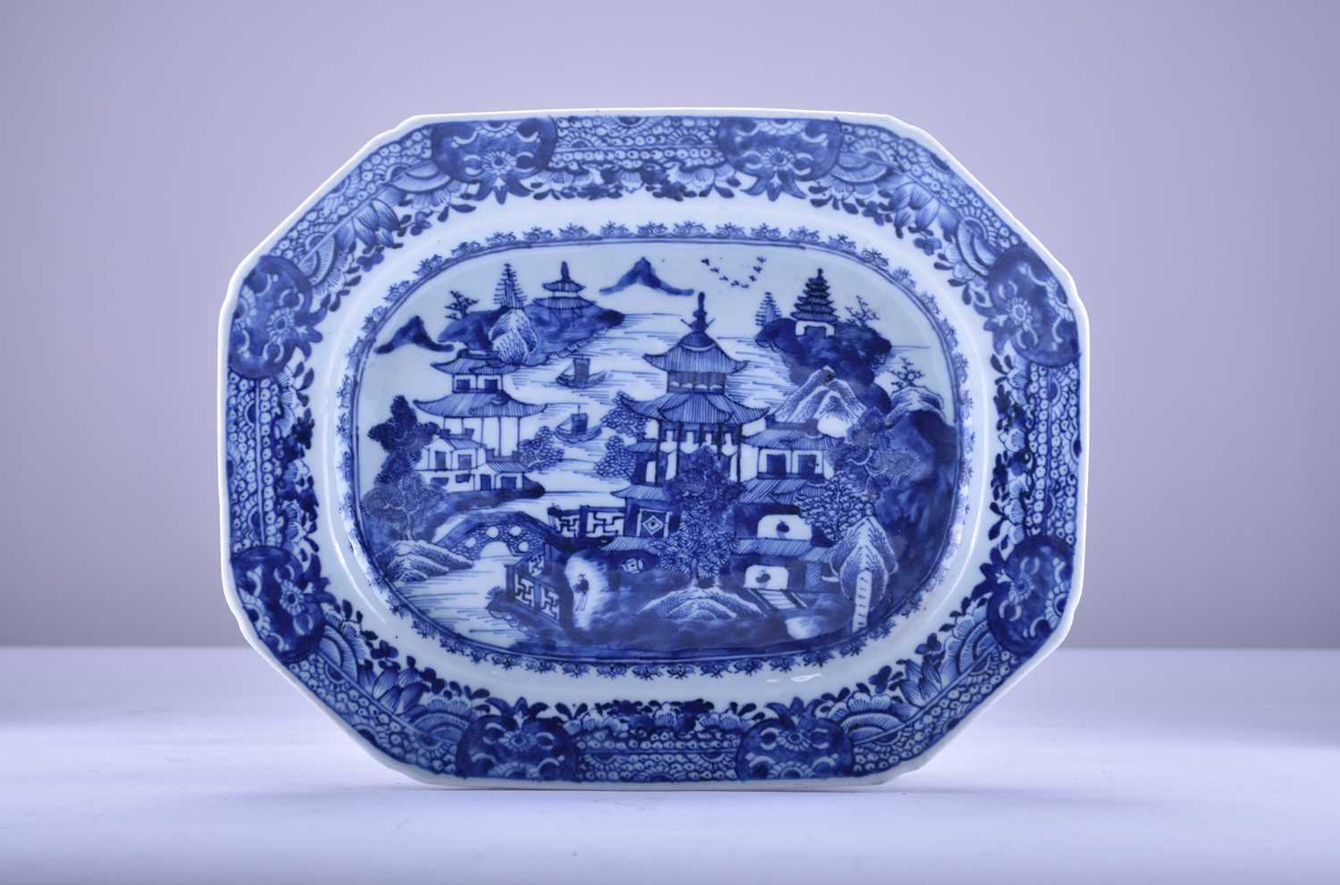Lot 515 - Two Chinese blue and white platters and an oval dish, 18th century