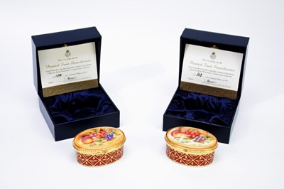 Lot 452 - A pair of Royal Worcester fruit-painted trinket pots and covers