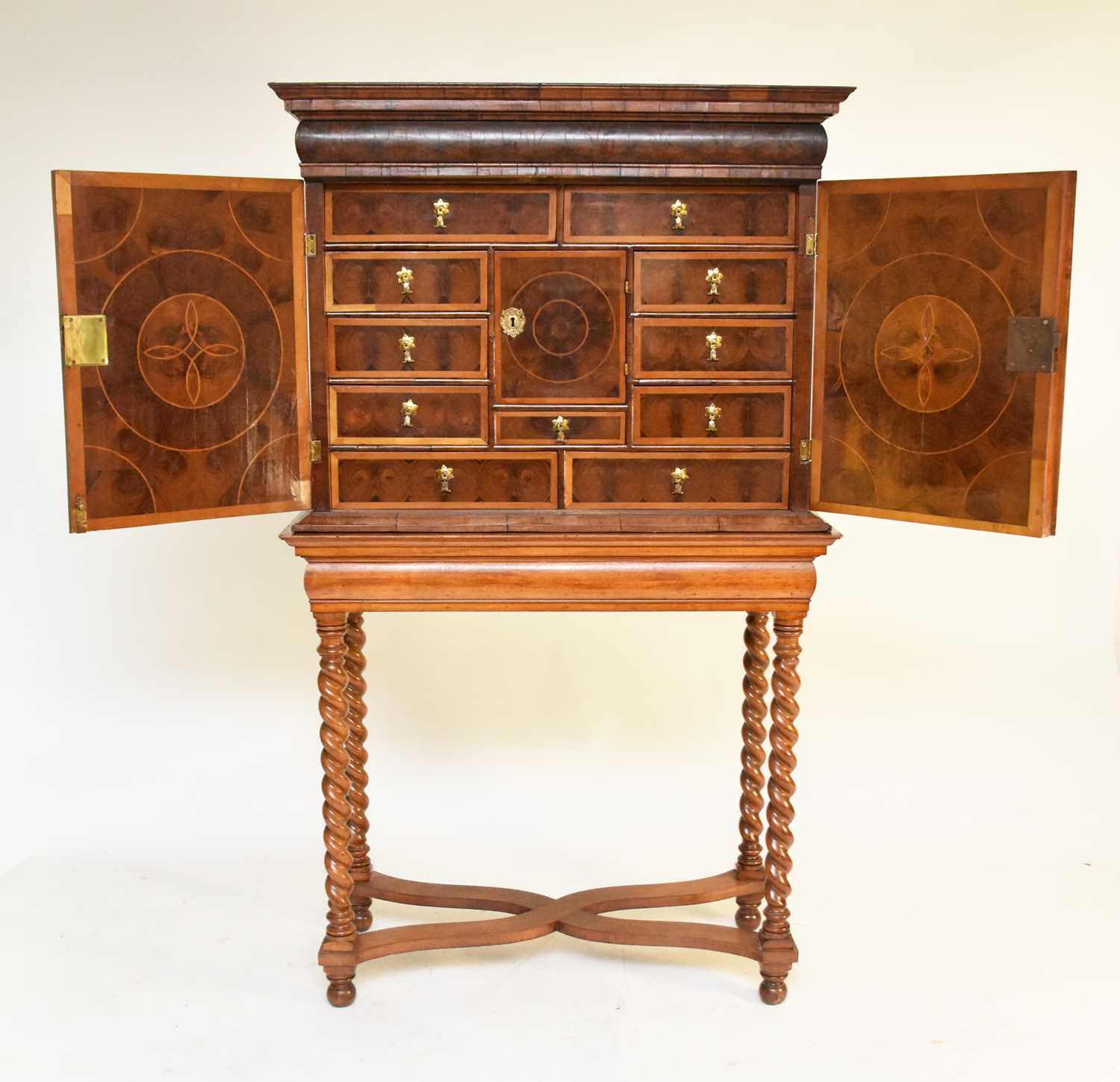 295 - A William and Mary oyster veneered cabinet on a later stand