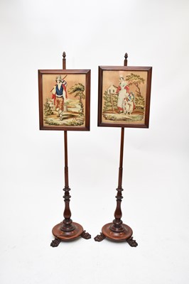 Lot 707 - A pair of 19th century, Regency style mahogany pole screens (2)