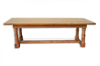 Lot 743 - A large pine refectory type dining table