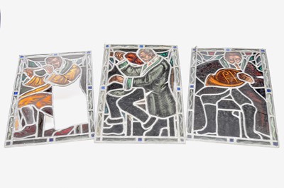 Lot 533 - Three 19th century stained glass panels representing musicians