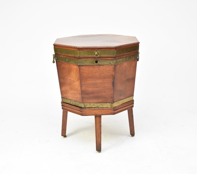 Lot 668 - A George III hexagonal, brass coopered, mahogany wine cooler