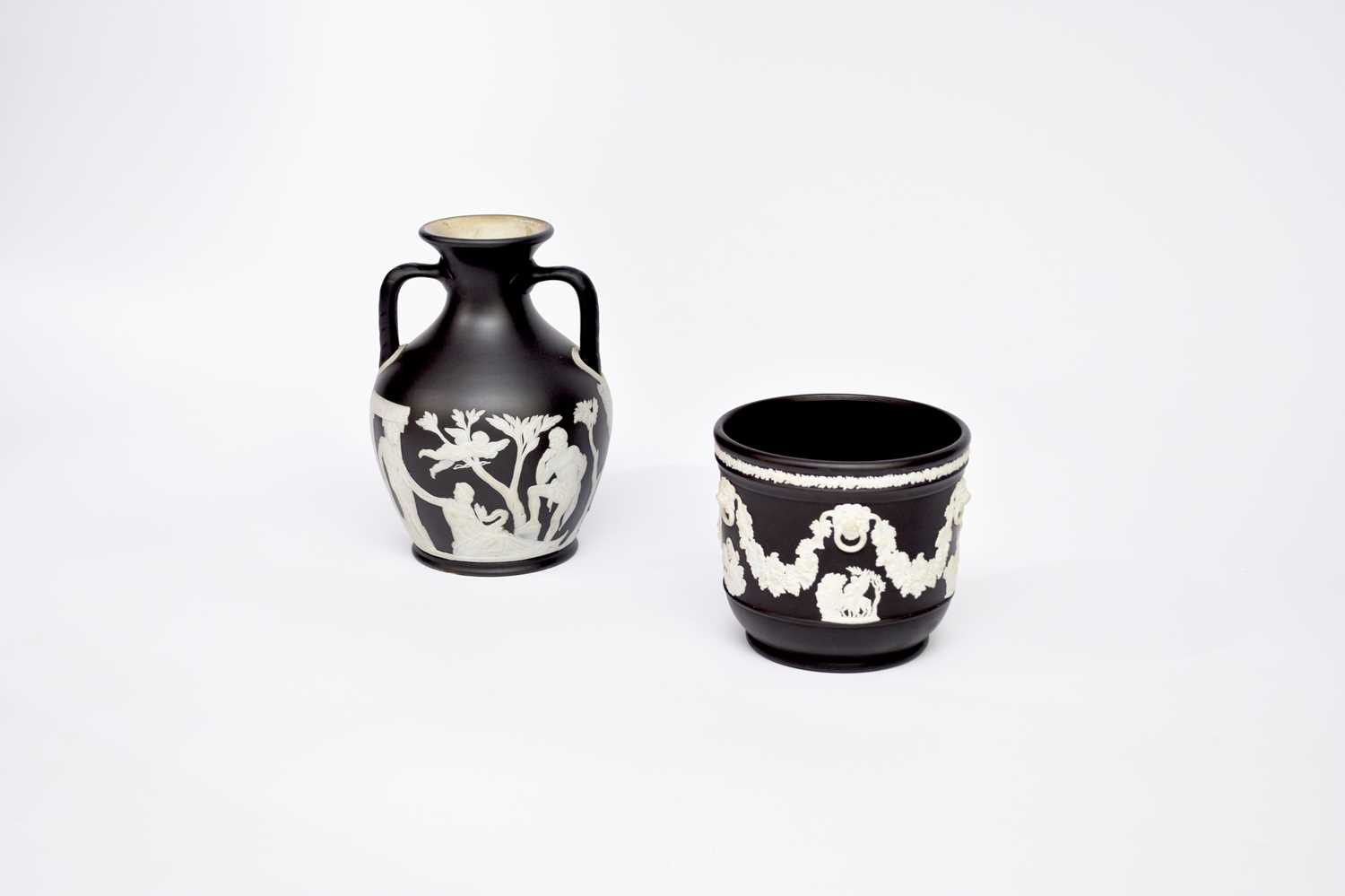 Lot 421 - Wedgwood black jasperware Portland vase and a cachepot