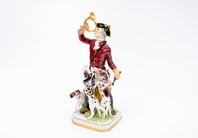 Lot 473 - Meissen porcelain huntsman with horn and hounds, mid-20th century