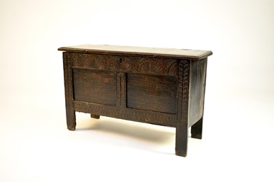 Lot 670 - A late 17th century carved oak coffer