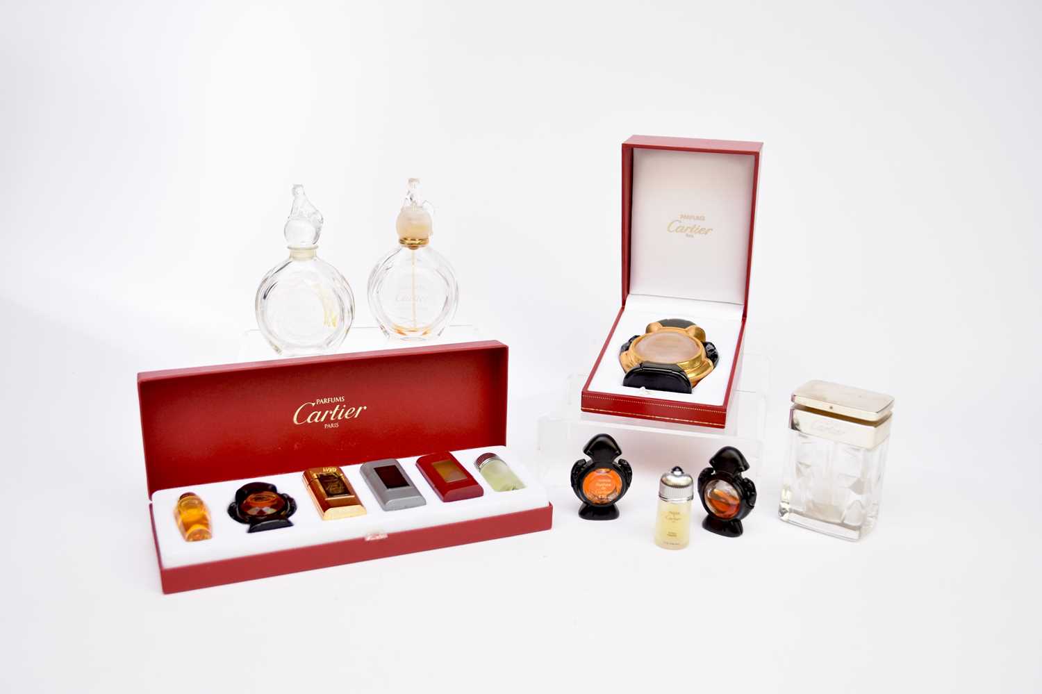 Lot 369 A collection of Cartier Paris perfume and