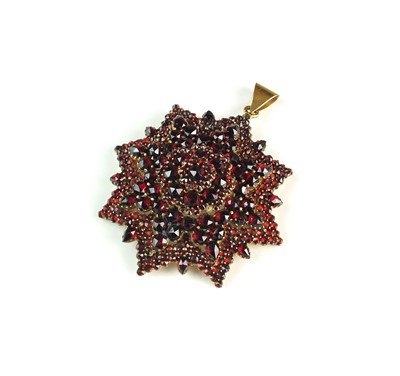 Lot 87 - A late 19th century Bohemian garnet cluster pendant