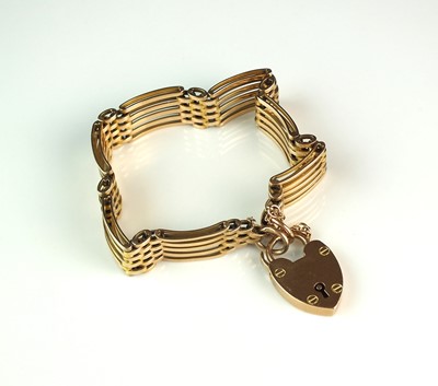 Lot 68 - A yellow metal five bar gate link bracelet