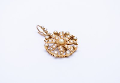 Lot 195 - A late 19th century seed pearl set pendant