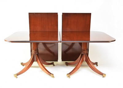 Lot 684 - A George III style mahogany twin-pedestal dining table