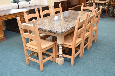 Lot 744 - A modern granite-topped kitchen table a set of eight rush-seated dining chairs