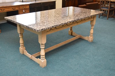 Lot 744 - A modern granite-topped kitchen table a set of eight rush-seated dining chairs