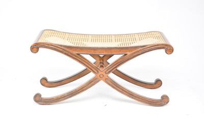 Lot 296 - And So to Bed, London: A Regency style bergere type X-frame bench seat