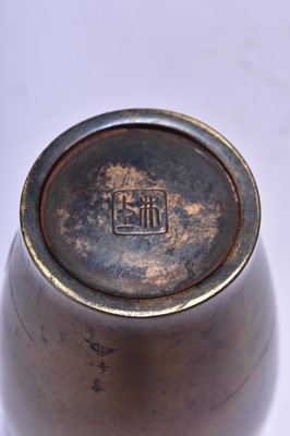 Lot 107 - A small Japanese inlaid bronze vase, Meiji era