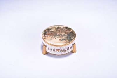 Lot 99 - A small Japanese Satsuma pot and cover, Meiji era
